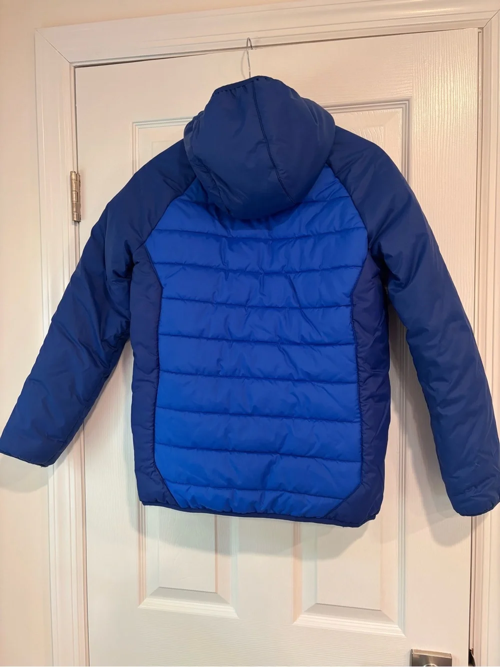 Under Armour Tuckerman Puffer Jacket in royal blue youth size large